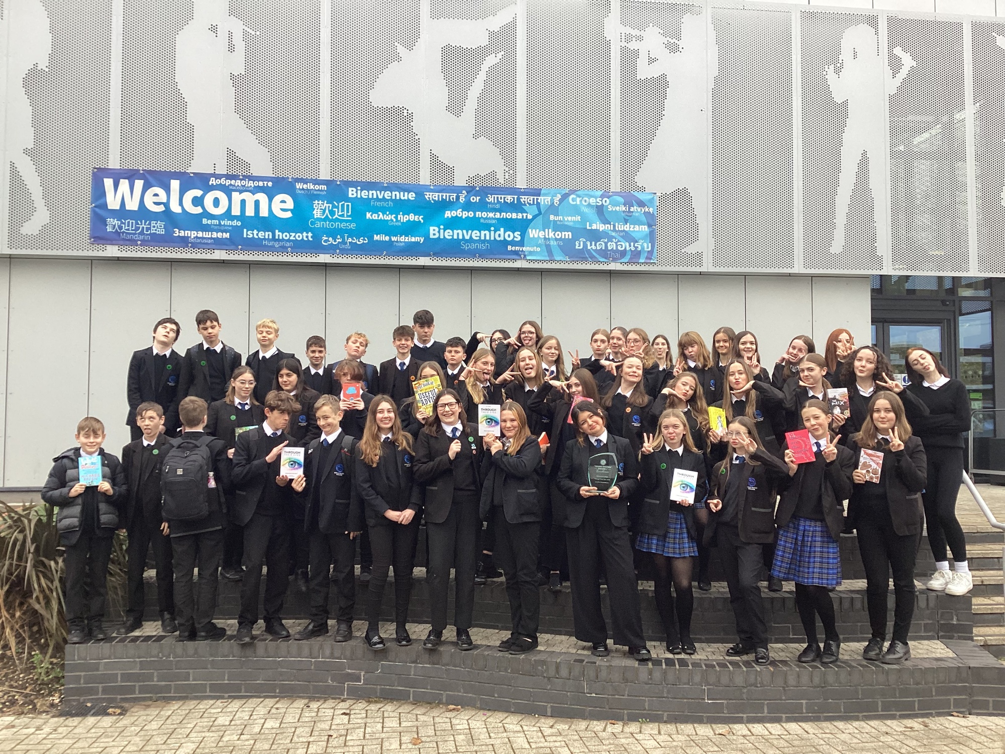 Image shows some of the pupils that took part in the Through their eyes poetry competition pulling faces and making fun poses