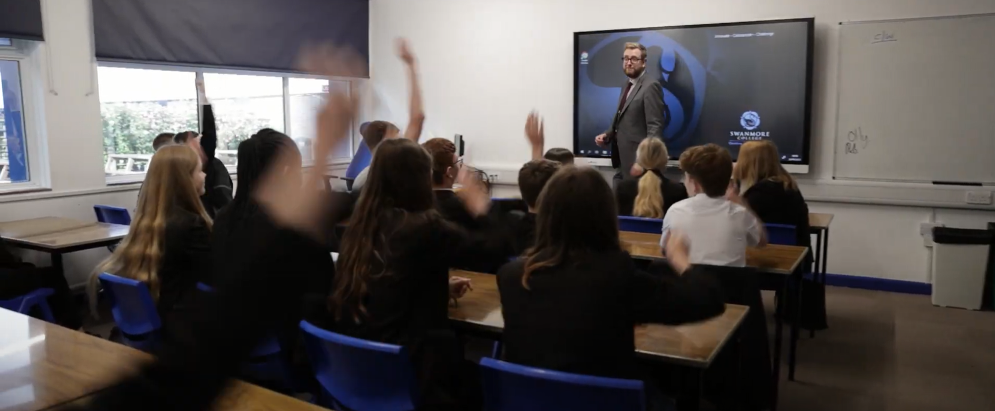 Image shows pupils enjoying their class.