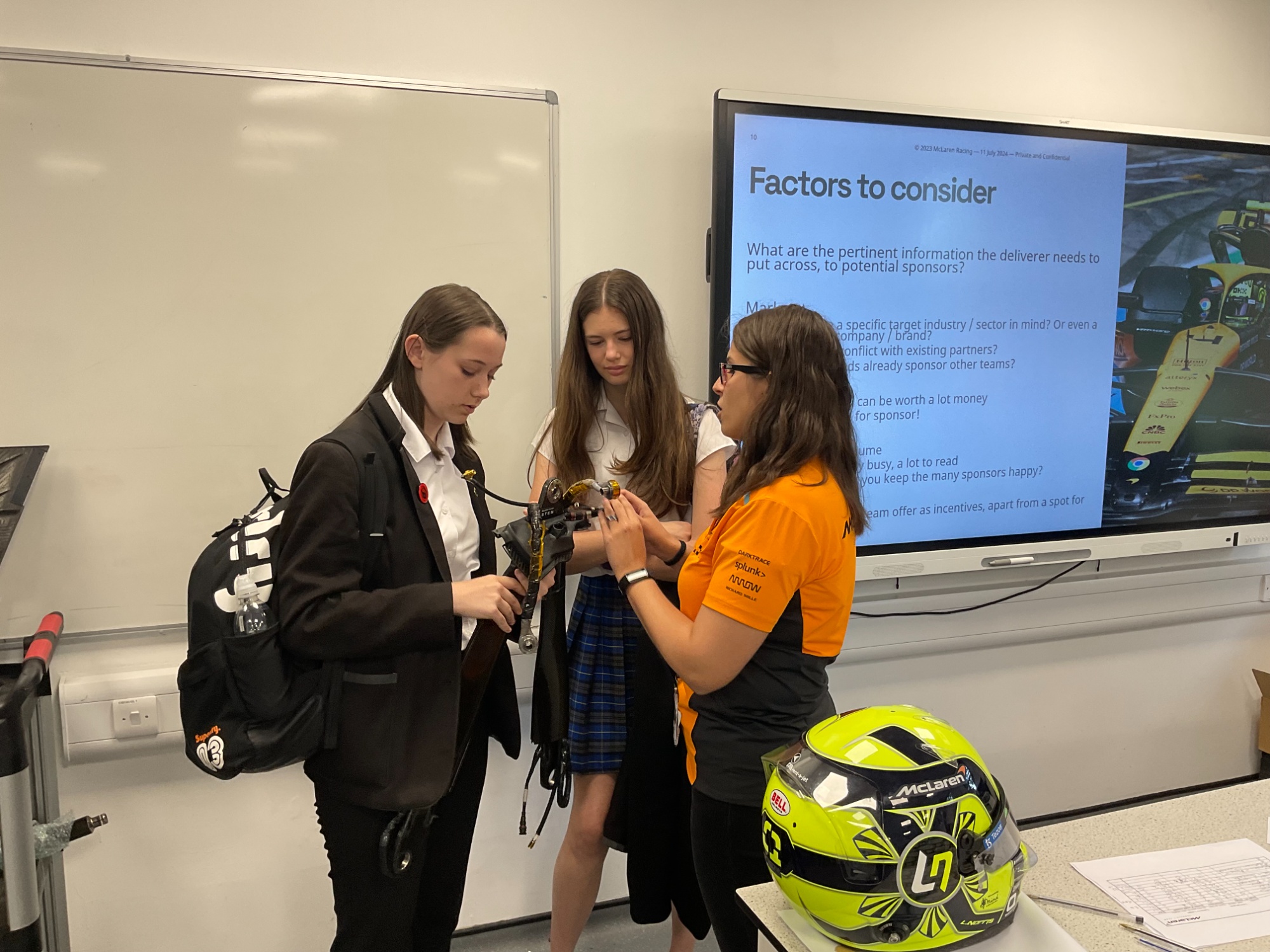 Image shows McClaren visitor with Year 10 pupils.