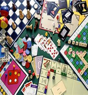 Image shows lots of different types of board games, including chess, Ludo, Scrabble and Monopoly