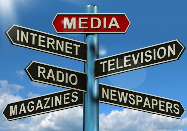 Image shows a signpost with the word Media at the top and directional signs with forms of media on, including internet, radio, magazines, television and newspapers